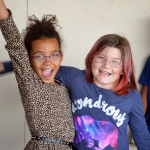 Two students posing together